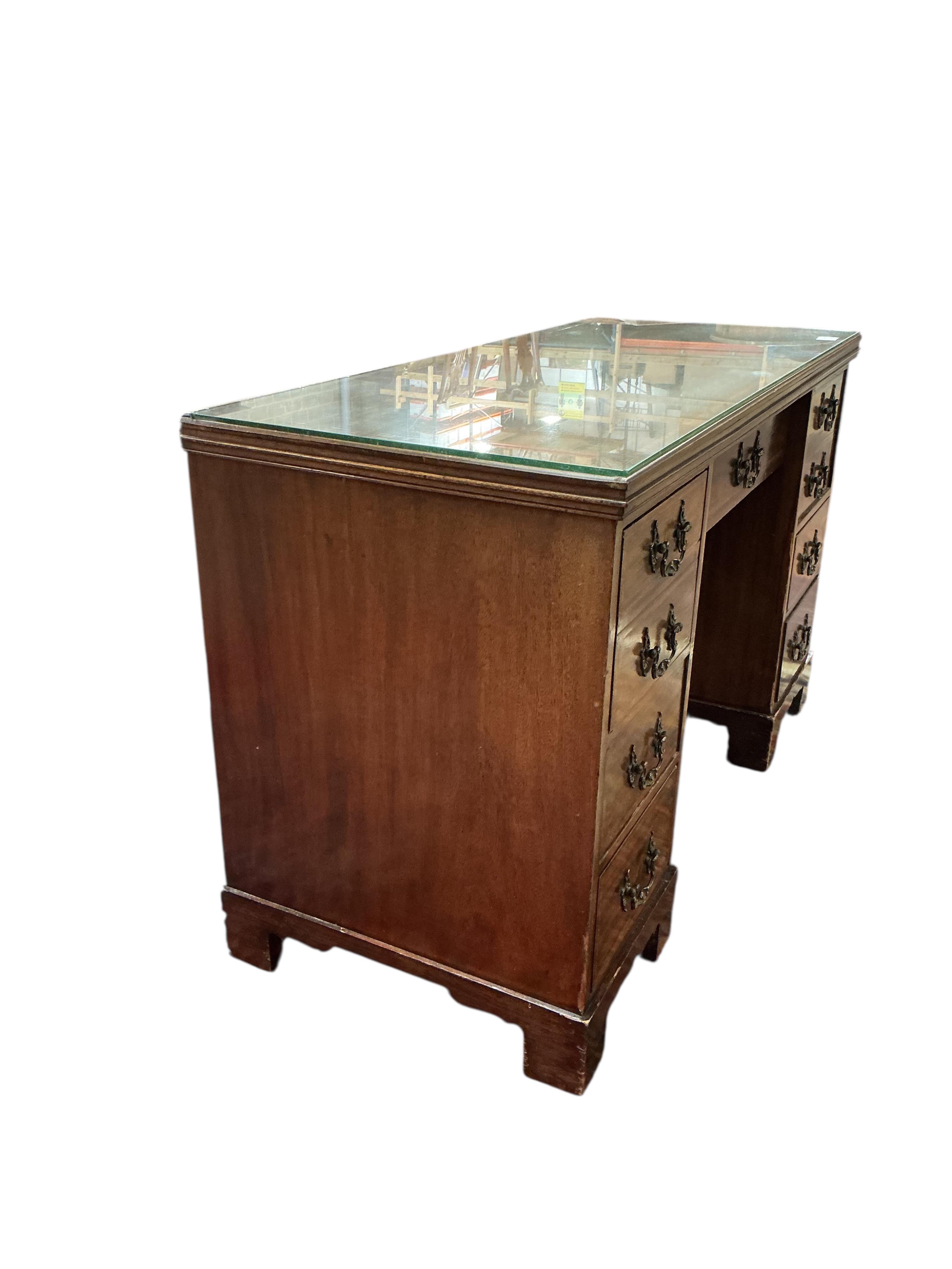 An Edwardian inlaid mahogany kneehole dressing table, width 120cm, depth 53cm, height 74cm